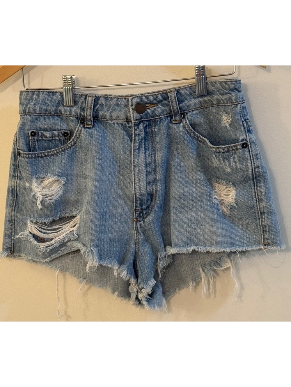 BDG High Rise Cheeky Distressed Denim Shorts with Artistic Back Pockets